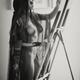Woman artist painting naked in her home studio Black and white portrai... (thumbnail)