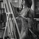 Fine art nude black and white portrait of woman artist painting naked... (thumbnail)