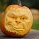 Artistically carved face in a pumpkin for Halloween decoration... (thumbnail)