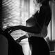 Sensual black and white boudoir portrait of woman in sexy sheer blouse... (thumbnail)