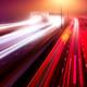 Artistic abstract highway traffic light trails in fog at nighttime... (thumbnail)