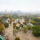 People in Osaka Castle Park site on misty rainy autumn day... (thumbnail)