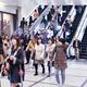 People on train station escalators in Japan... (thumbnail)