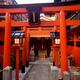 Orange Torii of a small Inari Shinto shrine in Kyoto... (thumbnail)