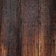 Charred dark wooden boards abstract background texture... (thumbnail)