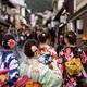 Teenage girls in colorful kimono walking on Matsubara dori street in K... (thumbnail)