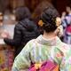 Japanese girl in colorful yukata kimono with pretty hairstyle and colo... (thumbnail)
