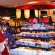 Japanese women in kimonos looking at souvenir store display in Kyoto J... (thumbnail)