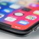 Closeup of iPhone X corner of display focused on mail app... (thumbnail)