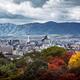 Kyoto tower in the city landscape with eagle flying by under dramatic... (thumbnail)