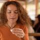 Woman drinking sake in Japanese restaurant in Kyoto... (thumbnail)