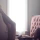 Artistic nude portrait of beautiful woman lying naked in armchair with... (thumbnail)