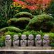 Six cute little monks Buddha stone statues in Japanese garden... (thumbnail)