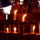 Lit candles at a small Shinto shrine with Kitsune foxes at Fushimi Ina... (thumbnail)