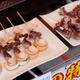 Japanese street food grilled seafood skewers with scallop and baby oct... (thumbnail)