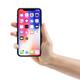 Hand holding Apple iPhone X smartphone isolated on white... (thumbnail)