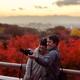 People taking a picture of themselves at Kiyomizu-dera in autumn sunse... (thumbnail)