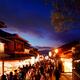 Matsubara dori street in Kyoto at night full of people and bright ligh... (thumbnail)