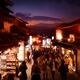 Matsubara dori street in Kyoto at night with brightly lit souvenir sho... (thumbnail)