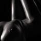 Black and white art nude portrait of a sexy woman body with in dim lig... (thumbnail)