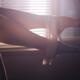 Sensual erotic closeup of sexy woman legs with white underwear hanging... (thumbnail)