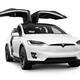 White Tesla X luxury SUV electric car with open falcon-wing doors... (thumbnail)