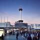 View on Kyoto tower from Kyoto Station busy with people in the evening... (thumbnail)