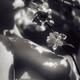 Nude woman body and bare breasts touching gentle apple tree blossoms b... (thumbnail)
