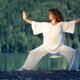 Young woman Tai Chi Chuan practitioner practicing a Taiji Ban Ma Bu st... (thumbnail)