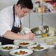 Executive Chef Quang Dang preparing a gourmet competition meal at BC S... (thumbnail)