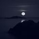Rising big Full Harvest Moon above Pacific ocean Monochrome... (thumbnail)