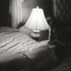 Vintage art nude portrait of the back of a beautiful naked woman lying... (thumbnail)