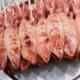Ikayaki grilled squid skewers Japanese street food at a market stall... (thumbnail)