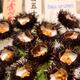 Uni sea urchin sashimi Japanese seafood delicacy at food market... (thumbnail)