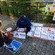 Woman gets her name written in Japanese characters by a street artist... (thumbnail)