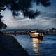 Sightseeing pleasure cruise boat illuminated with lights on Uji River... (thumbnail)