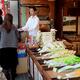 People sampling green tea at a tea shop in Japan... (thumbnail)