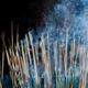 Smoke from incense joss sticks in a Japanese temple lit by sunlight... (thumbnail)
