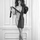Sexy fashion black and white portrait of a woman in a trench coat cove... (thumbnail)
