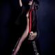 Asian woman in black and red untied kimono revealing her naked body st... (thumbnail)