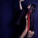 Artistic sensual portrait of a beautiful Asian woman with a hand fan w... (thumbnail)