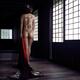 Mysterious asian woman with a dragon body tattoo art on her naked back... (thumbnail)