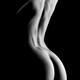 Artistic nude woman naked back and buttocks on black... (thumbnail)