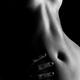 Nude woman body parts closeup of stomach and breasts... (thumbnail)