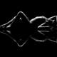 Abstract art nude figure of a woman lying on reflective black backgrou... (thumbnail)