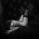 Sensual body of a woman lying in bed naked wearing only stockings Blac... (thumbnail)