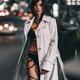 Beautiful sexy woman provocatively dressed walking on a city street... (thumbnail)