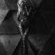 Dramatic sexy portrait of a beautiful blond woman in black lacy bodyst... (thumbnail)