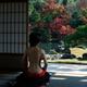 Sensual asian woman with naked back sitting in a Japanese house with a... (thumbnail)