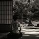 Woman with her kimono lowered revealing her naked back with a dragon t... (thumbnail)